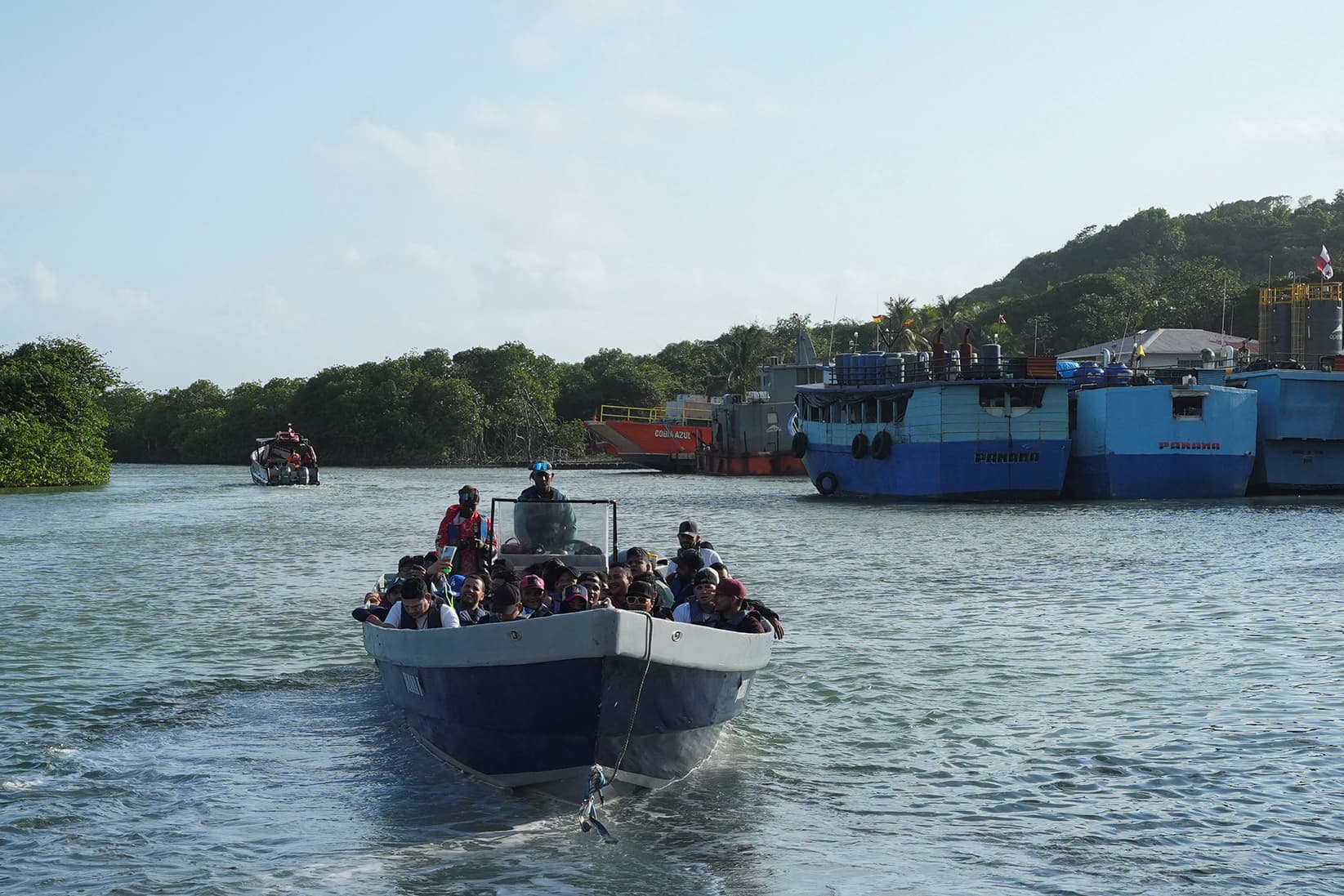 A boat bound for Colombia with Venezuelan migrants leaves the port of Miramar as several migrants return to Venezuela following deportation, failed attempts to enter the United States amid tougher migration policies, or self‑deportation, amid renewed hopes of returning home following the U.S. capture of Nicolas Maduro and prospects for democratic elections and economic recovery, in Miramar, Panama, January 14, 2026.