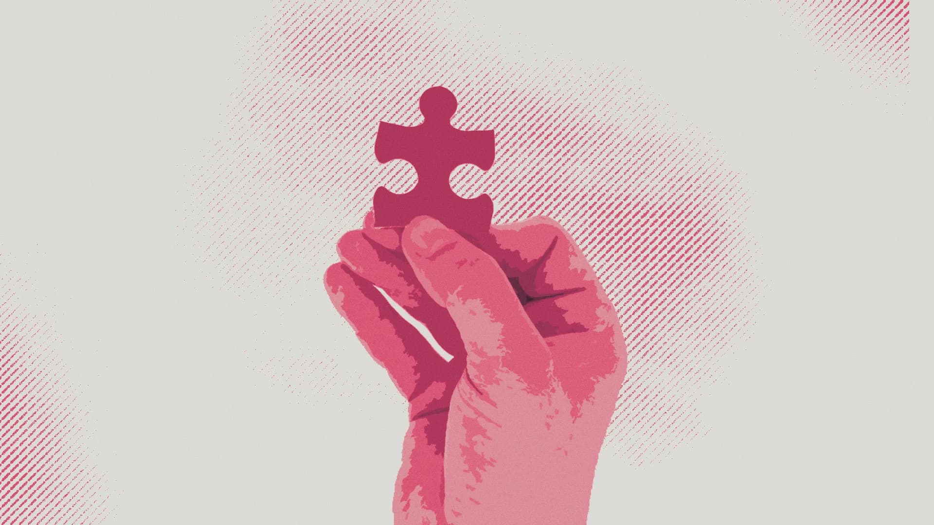 A stylised image of a hand holding a puzzle piece.